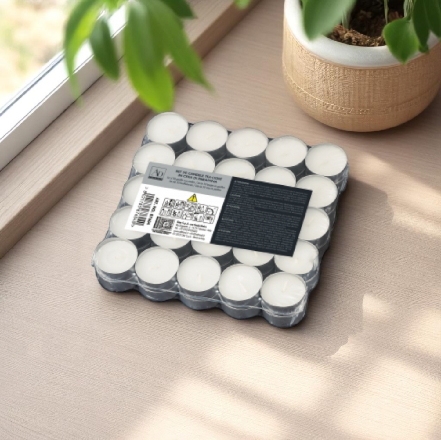 Set da 50 pezzi candele da te, tea light ambientate su un piano in legno vicino ad una finestra.
Venduto da Prodomo negozio online di Casalinghi