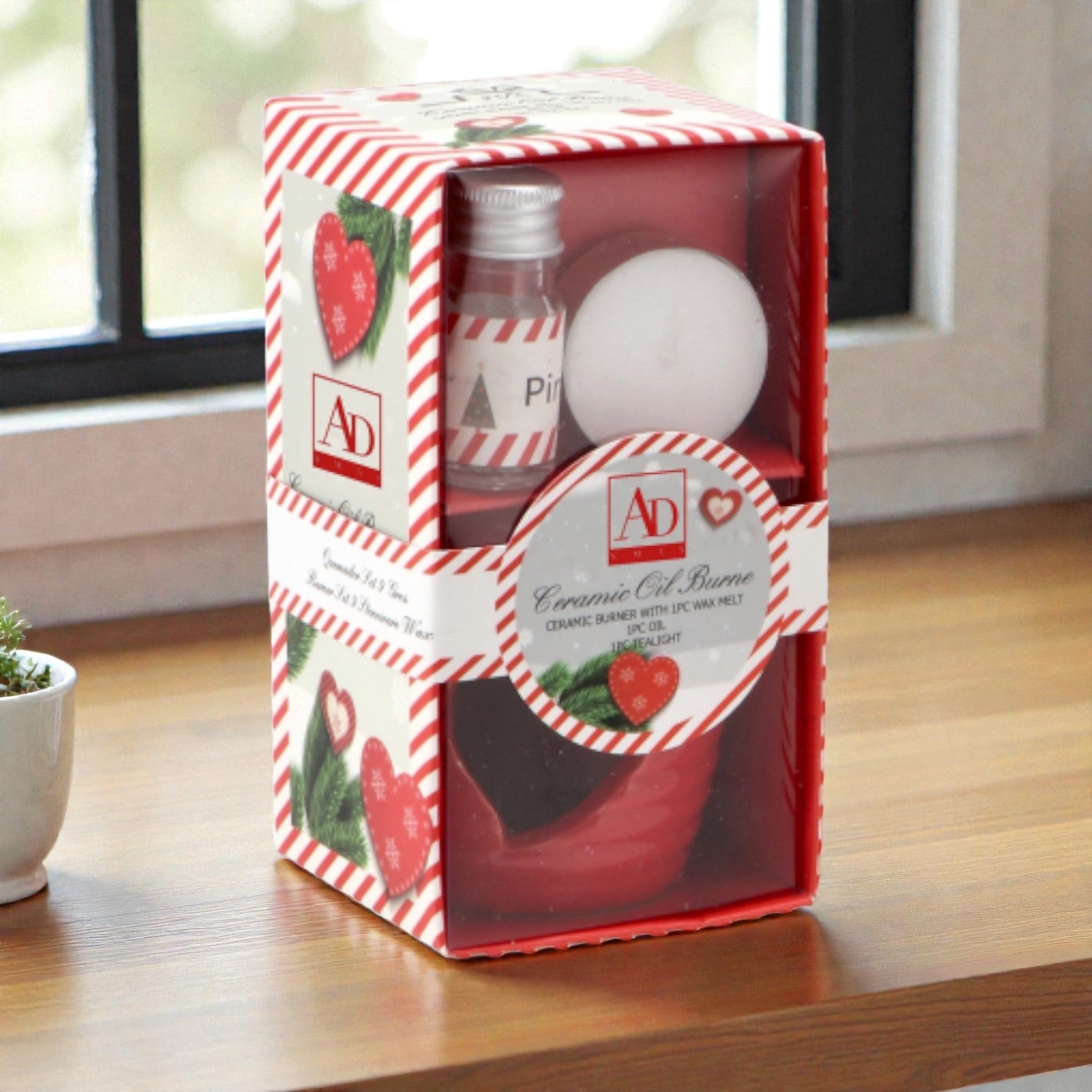 Kit candele brucia oli essenziali, ambientato in una casa accogliente e festiva.