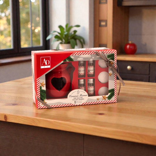 Kit candele brucia oli essenziali, ambientato in una casa accogliente e festiva.