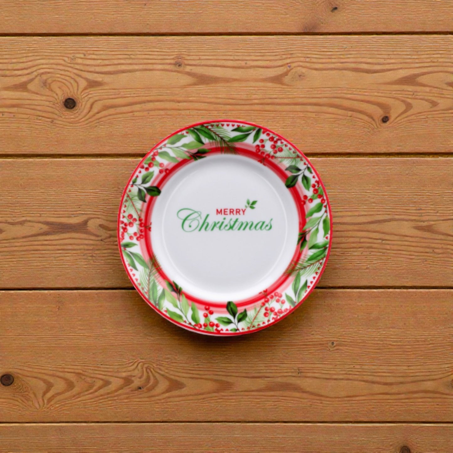 Piatto di natale bianco merry christmas in porcellana bianco con disegni vischio e righe rosse e verdi.
