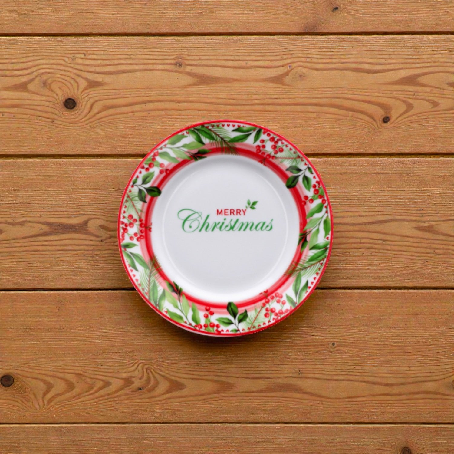 Piatto di natale bianco merry christmas in porcellana bianco con disegni vischio e righe rosse e verdi.