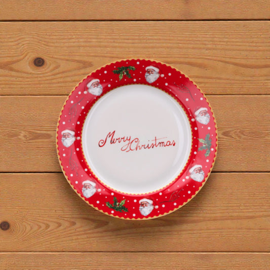 Piatto di natale bianco merry christmas in porcellana bianco con disegni vischio e babbo natale e righe rosse e verdi.