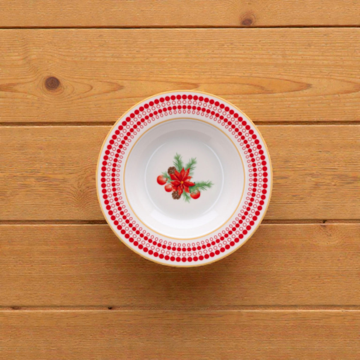 Piatto di natale bianco merry christmas in porcellana bianco con disegni vischio e fiori di natale e righe rosse e verdi.