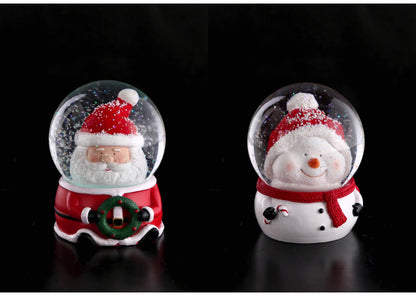 Palla di neve con babbo natale e pupazzo di neve e base in resina a LED, con sfondo nero